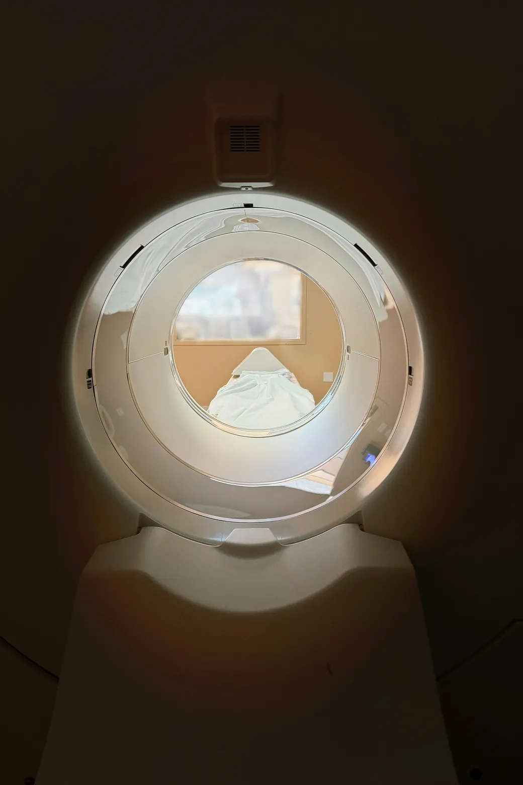 A patient positioned in a scanner bore